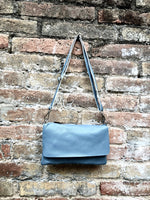 Small leather bag in DENIM BLUE. Crossbody or shoulder bag in GENUINE leather. Blue-gray purse with adjustable strap. flap and zipper.