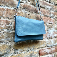 Small leather bag in DENIM BLUE. Crossbody or shoulder bag in GENUINE leather. Blue-gray purse with adjustable strap. flap and zipper.