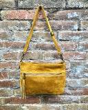 Boho suede leather bag in MUSTARD YELLOW. Crossbody / shoulder bag in genuine leather bag. Yellow suede purse with tassel.