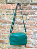 Small leather bag in green. GENUINE leather crossbody / shoulder bag. Small green leather purse. Adjustable strap + zippers. Gold accents.