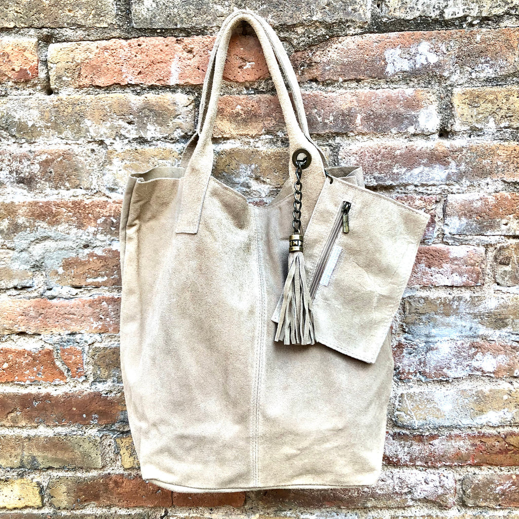 Beige leather shopper bag in genuine suede. Slouchy beige carry all tote bag for laptops, tablets, books. Suede leather purse with tassel