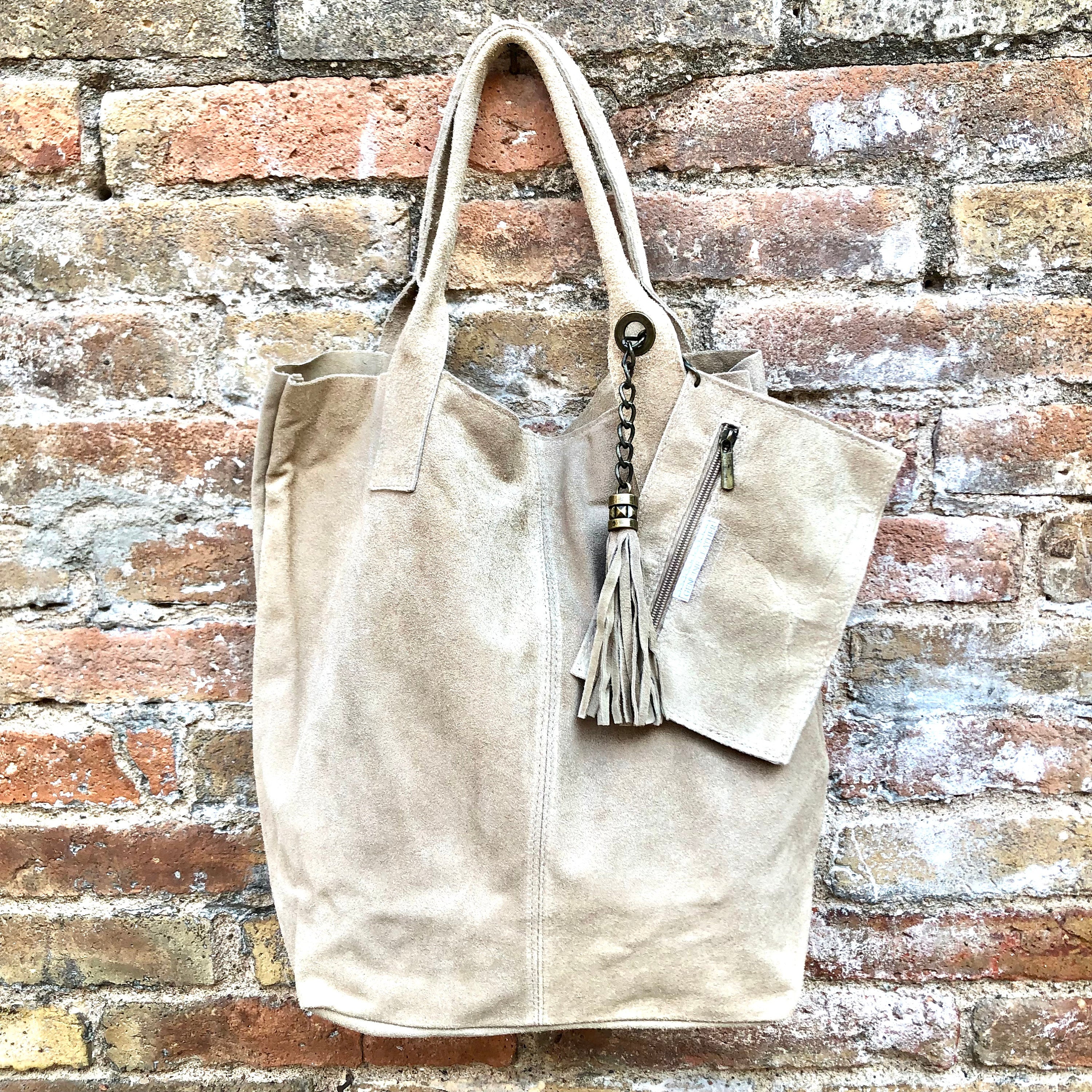 Beige leather shopper bag in genuine suede. Slouchy beige carry all tote bag for laptops, tablets, books. Suede leather purse with tassel