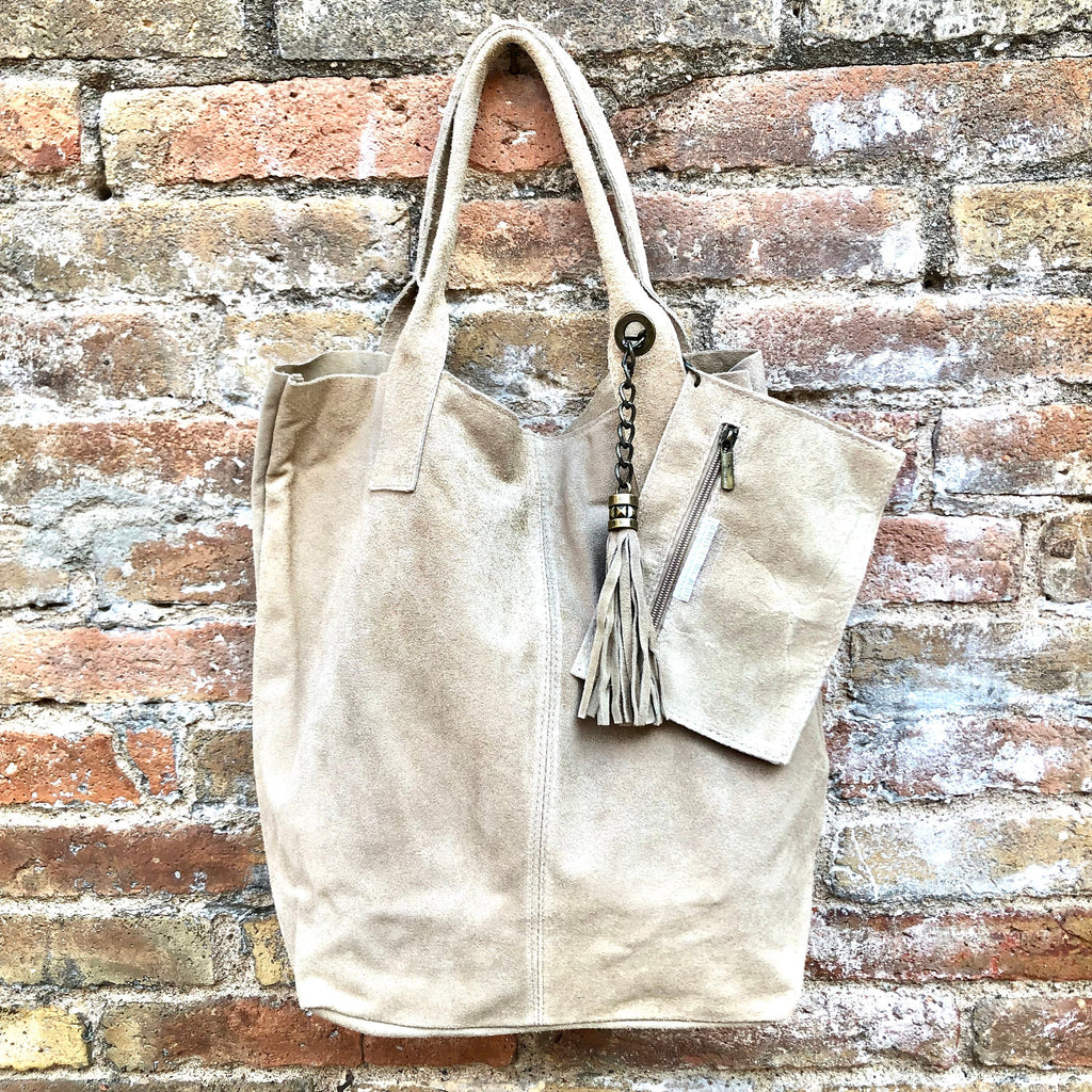 Beige leather shopper bag in genuine suede. Slouchy beige carry all tote bag for laptops, tablets, books. Suede leather purse with tassel