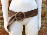 Light brown suede waist belt with large round buckle. Soft suede belt in taupe color. Boho suede belt. Greyge genuine natural suede leather.