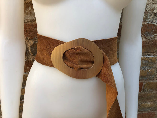 Camel brown suede waist belt with large metal buckle. Soft suede belt in light saddle brown. Boho suede belt. Genuine natural suede leather.