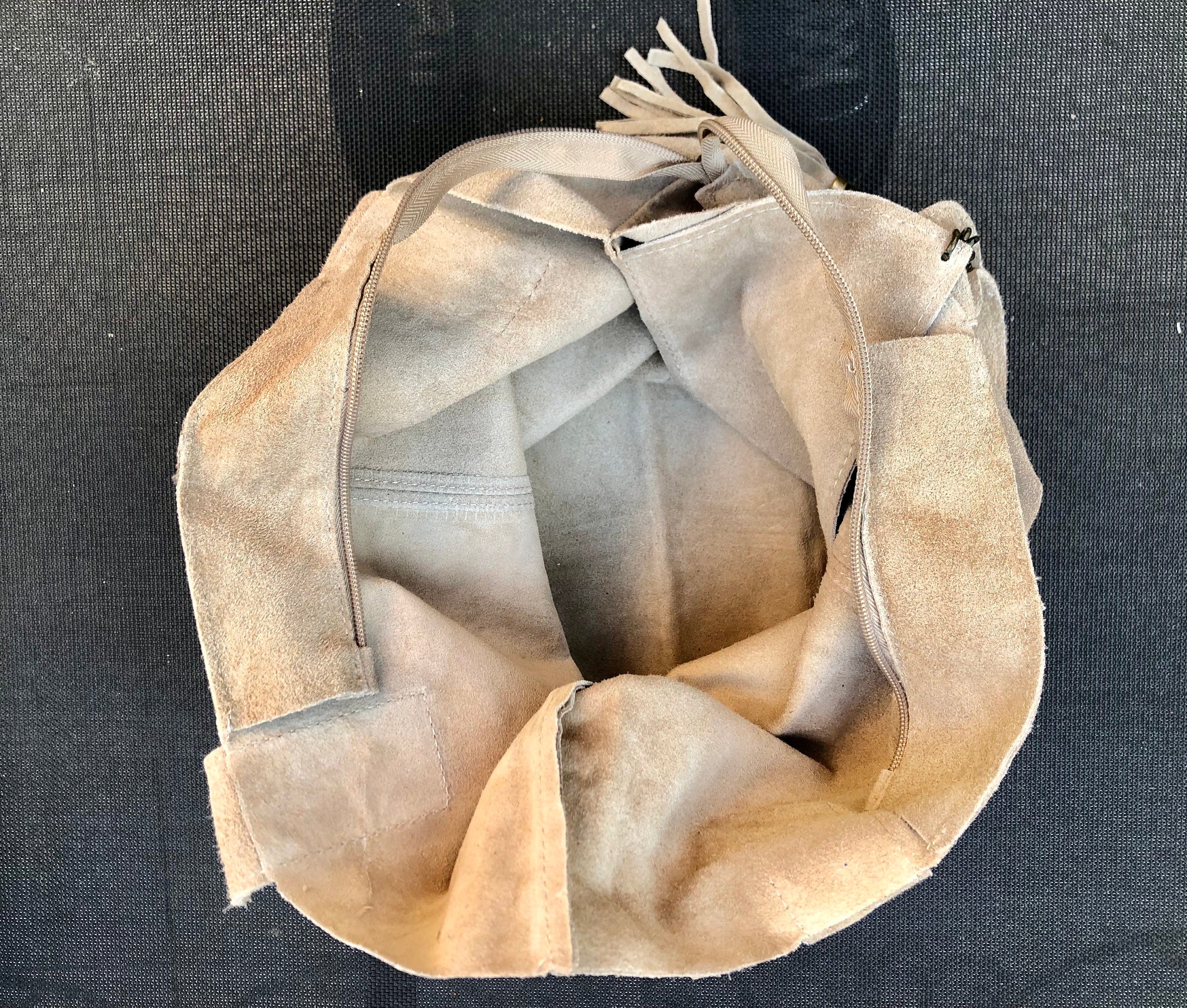 Beige leather shopper bag in genuine suede. Slouchy beige carry all tote bag for laptops, tablets, books. Suede leather purse with tassel