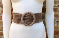 Light brown suede waist belt with large round buckle. Soft suede belt in taupe color. Boho suede belt. Greyge genuine natural suede leather.