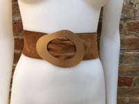 Camel brown suede waist belt with large metal buckle. Soft suede belt in light saddle brown. Boho suede belt. Genuine natural suede leather.