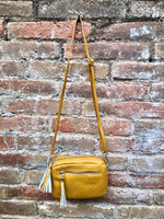 Small leather yellow bag. GENUINE leather shoulder or cross body bag. Mustard yellow leather purse with tassels, adjustable strap and zipper