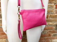 Small leather bag in Fuchsia pink. Cross body, shoulder bag or wristlet in GENUINE leather. Pink purse with adjustable strap. Soft leather.