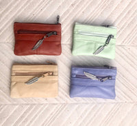 Small coin purse in genuine leather, 3 zippers. Fits credit cards, coins, bills. Small leather wallet. Beige, brown, purple, aqua green.