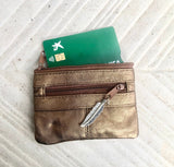 Small purse in metallic shine genuine leather, 3 zippers. Fits credit cards, coins, bills. Small leather wallet.Gold, silver, copper, purple