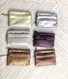 Small purse in metallic shine genuine leather, 3 zippers. Fits credit cards, coins, bills. Small leather wallet.Gold, silver, copper, purple