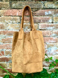 Camel brown leather shopper bag in genuine suede. Slouchy saddle brown carry all tote bag for laptops, tablets, books. Brown leather purse