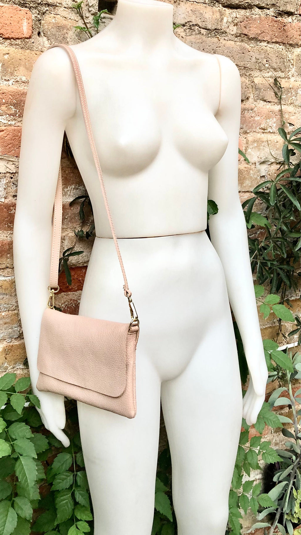 Small light dusty pink bag. Pink crossbody/ shoulder bag in GENUINE leather. Adjustable strap , zipper + flap. Light dusty pink purse