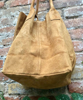 Camel brown leather shopper bag in genuine suede. Slouchy saddle brown carry all tote bag for laptops, tablets, books. Brown leather purse