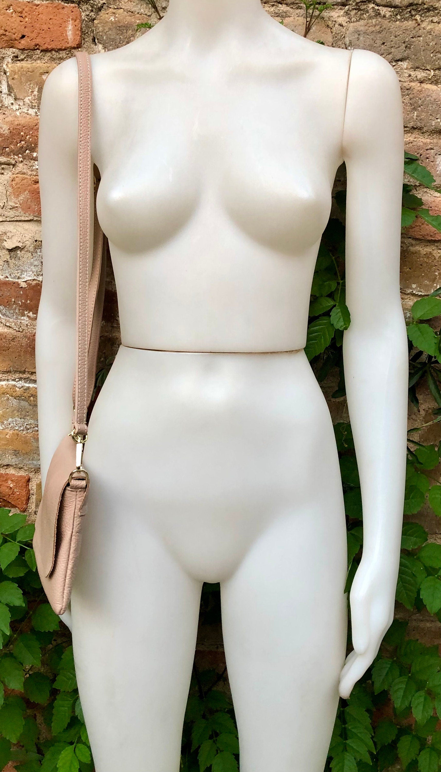 Small light dusty pink bag. Pink crossbody/ shoulder bag in GENUINE leather. Adjustable strap , zipper + flap. Light dusty pink purse