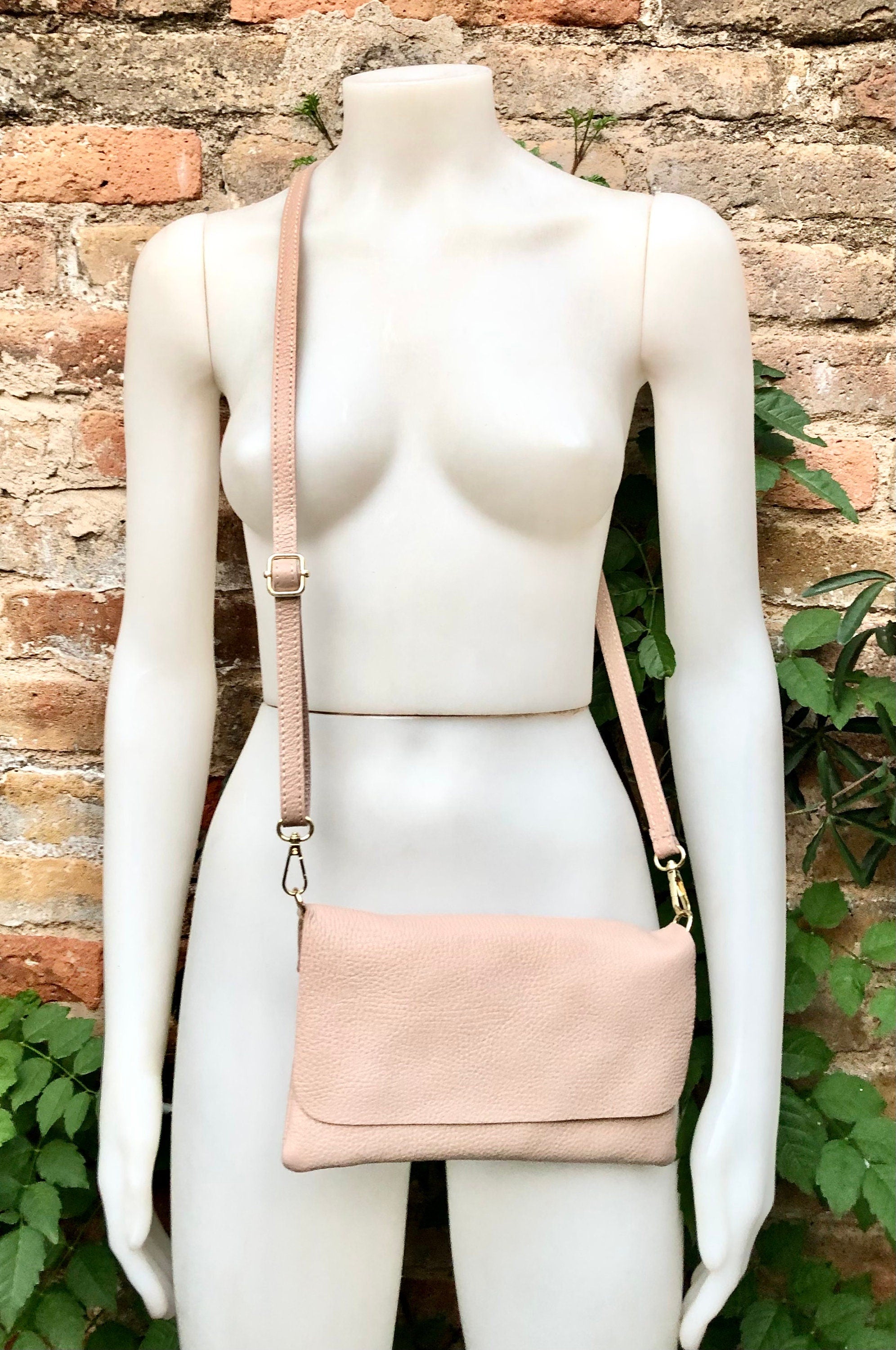 Small light dusty pink bag. Pink crossbody/ shoulder bag in GENUINE leather. Adjustable strap , zipper + flap. Light dusty pink purse