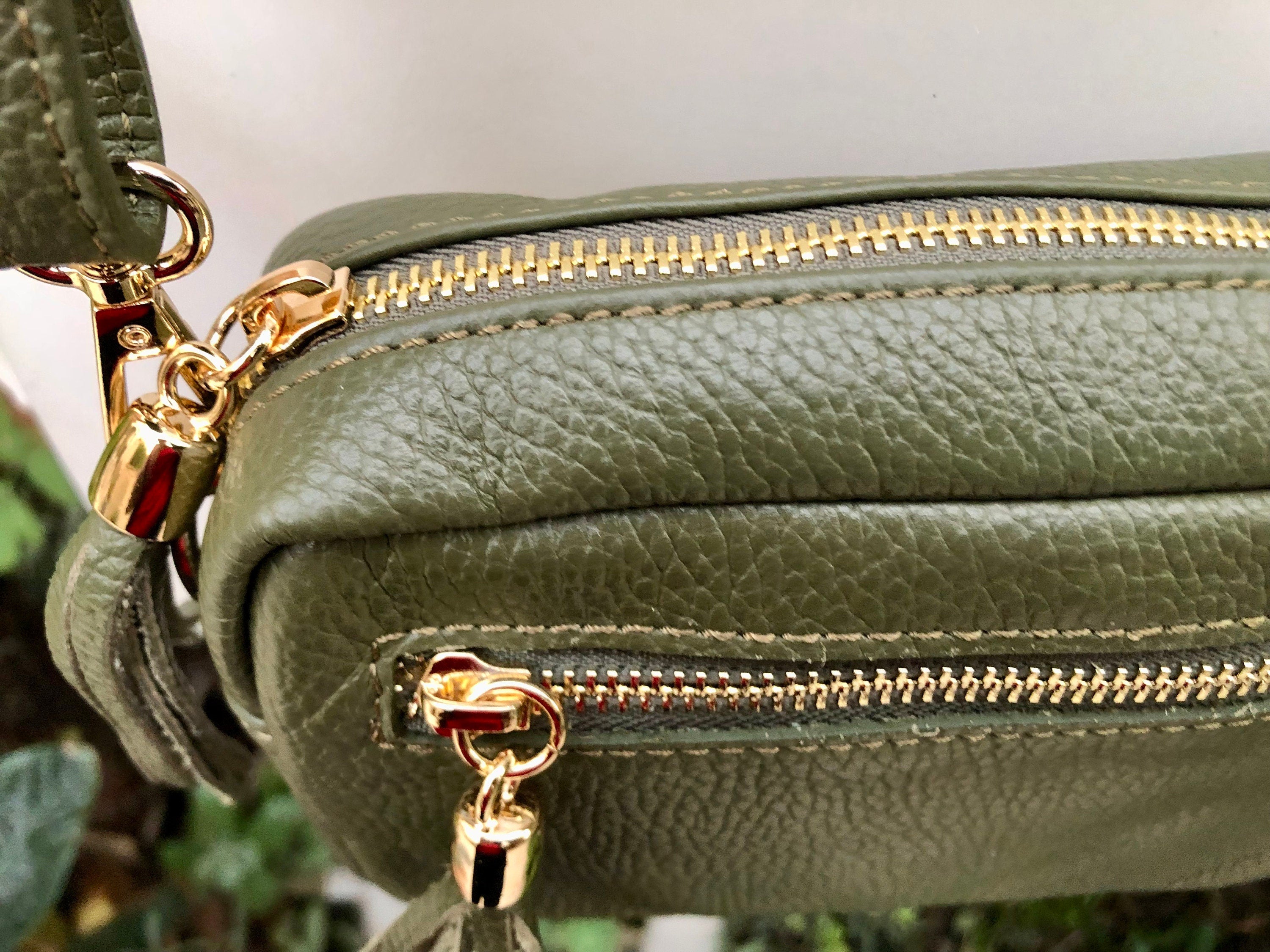 Small green leather bag. GENUINE leather shoulder or cross body bag. Khaki green leather purse with tassels, adjustable strap and zipper