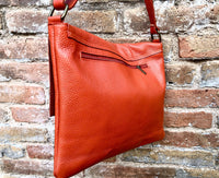 Orange crossbody leather bag. Soft genuine leather bag. Orange messenger. Orange purse with zipper, flap and adjustable strap.