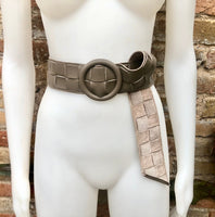 Light brown leather waist belt with large round buckle. Boho soft genuine leather belt in taupe color. Tan wide waist belt. Braided leather