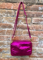 Small leather bag in metallic fuchsia pink. Genuine leather cross body / shoulder bag. Hot pink glitter purse. Adjustable strap.Gold accents