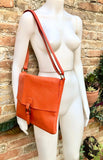 Orange crossbody leather bag. Soft genuine leather bag. Orange messenger. Orange purse with zipper, flap and adjustable strap.