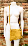 Mustard yellow suede leather bag. GENUINE leather small crossbody / shoulder bag.Adjustable strap + zipper.Mustard yellow purse with tassel