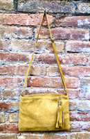 Mustard yellow suede leather bag. GENUINE leather small crossbody / shoulder bag.Adjustable strap + zipper.Mustard yellow purse with tassel