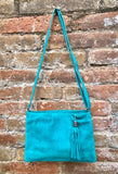 TURQUOISE suede leather bag. GENUINE leather small crossbody / shoulder bag.Adjustable strap and zipper. Turquoise blue purse with tassel.