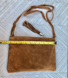 CAMEL BROWN suede leather bag. GENUINE leather small crossbody / shoulder bag.Adjustable strap and zipper. Tan brown suede purse with tassel