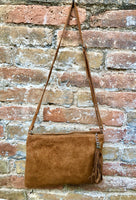 CAMEL BROWN suede leather bag. GENUINE leather small crossbody / shoulder bag.Adjustable strap and zipper. Tan brown suede purse with tassel