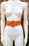 Orange suede waist belt with large round buckle. Boho soft suede belt in a bright orange shade. Genuine natural orange suede leather