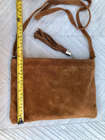 CAMEL BROWN suede leather bag. GENUINE leather small crossbody / shoulder bag.Adjustable strap and zipper. Tan brown suede purse with tassel