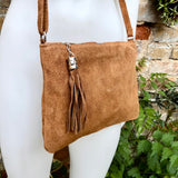 CAMEL BROWN suede leather bag. GENUINE leather small crossbody / shoulder bag.Adjustable strap and zipper. Tan brown suede purse with tassel