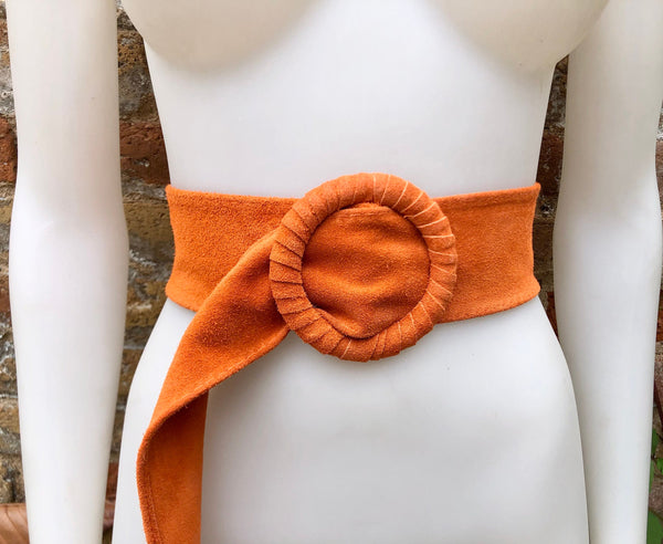 Orange suede waist belt with large round buckle. Boho soft suede belt in a bright orange shade. Genuine natural orange suede leather