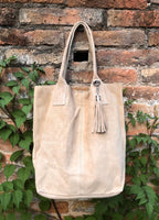 Beige leather shopper bag in genuine suede. Slouchy beige carry all tote bag for laptops, tablets, books. Suede leather purse with tassel