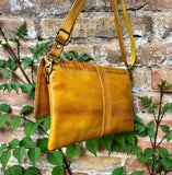 Small cross body bag in yellow “distressed” vintage style genuine leather. Enveloppe bag with adjustable strap and flap. Boho yellow purse