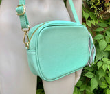 Small leather bag in aqua green. GENUINE leather cross body / shoulder bag. Light turquoise green purse. Tassel on the zipper. Gold accents.