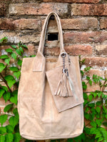 Beige leather shopper bag in genuine suede. Slouchy beige carry all tote bag for laptops, tablets, books. Suede leather purse with tassel