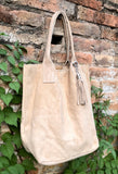 Beige leather shopper bag in genuine suede. Slouchy beige carry all tote bag for laptops, tablets, books. Suede leather purse with tassel