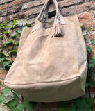 Beige leather shopper bag in genuine suede. Slouchy beige carry all tote bag for laptops, tablets, books. Suede leather purse with tassel