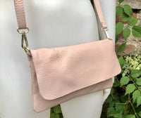 Small light dusty pink bag. Pink crossbody/ shoulder bag in GENUINE leather. Adjustable strap , zipper + flap. Light dusty pink purse