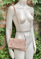 Small light dusty pink bag. Pink crossbody/ shoulder bag in GENUINE leather. Adjustable strap , zipper + flap. Light dusty pink purse