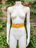 Yellow leather waist belt with large round buckle. Soft leather belt in mustard. Genuine leather dress belt. Mustard yellow wide waist belt