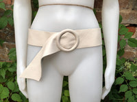 Cream leather waist belt with large round buckle. Soft leather belt in broken white. Genuine leather dress belt. Light beige wide waist belt