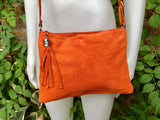 Orange suede leather bag. GENUINE leather small crossbody / shoulder bag.Adjustable strap + zipper. Orange suede purse with tassel.