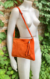 Orange suede leather bag. GENUINE leather small crossbody / shoulder bag.Adjustable strap + zipper. Orange suede purse with tassel.