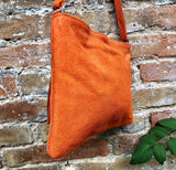 Orange suede leather bag. GENUINE leather small crossbody / shoulder bag.Adjustable strap + zipper. Orange suede purse with tassel.