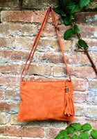 Orange suede leather bag. GENUINE leather small crossbody / shoulder bag.Adjustable strap + zipper. Orange suede purse with tassel.